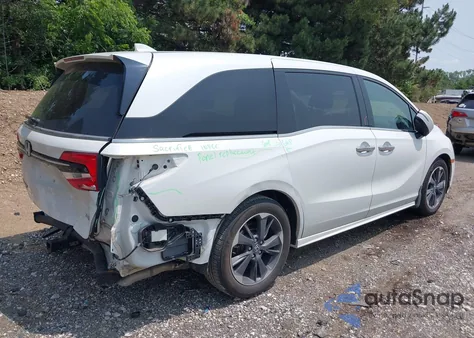 2023 Honda Odyssey Elite z USA, uszkodzony, nr VIN 5FNRL6H9XPB004959